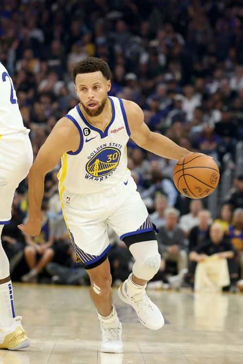 Stephen Curry #30 of the Golden State Warriors dribbles the ball during their game against the Los Angeles Lakers at Chase Center on October 18, 2022 in San Francisco, California. NOTE TO USER: User expressly acknowledges and agrees that, by downloading and or using this photograph, User is consenting to the terms and conditions of the Getty Images License Agreement. (Photo by Ezra Shaw/Getty Images)
