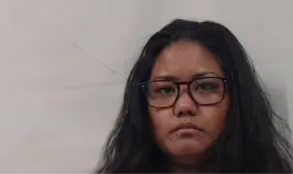 Ellio M. Hardman, also 33, was also charged for neglect of a child (West Virginia Regional Jail)
