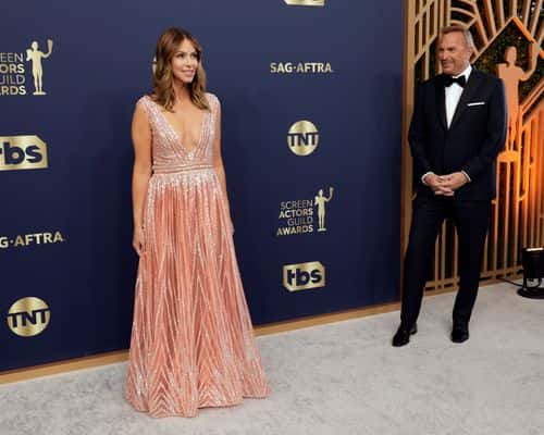 (L-R) Christine Baumgartner and Kevin Costner attend the 28th Annual Screen Actors&nbsp;Guild Awards at Barker Hangar on February 27, 2022 in Santa Monica, California.
