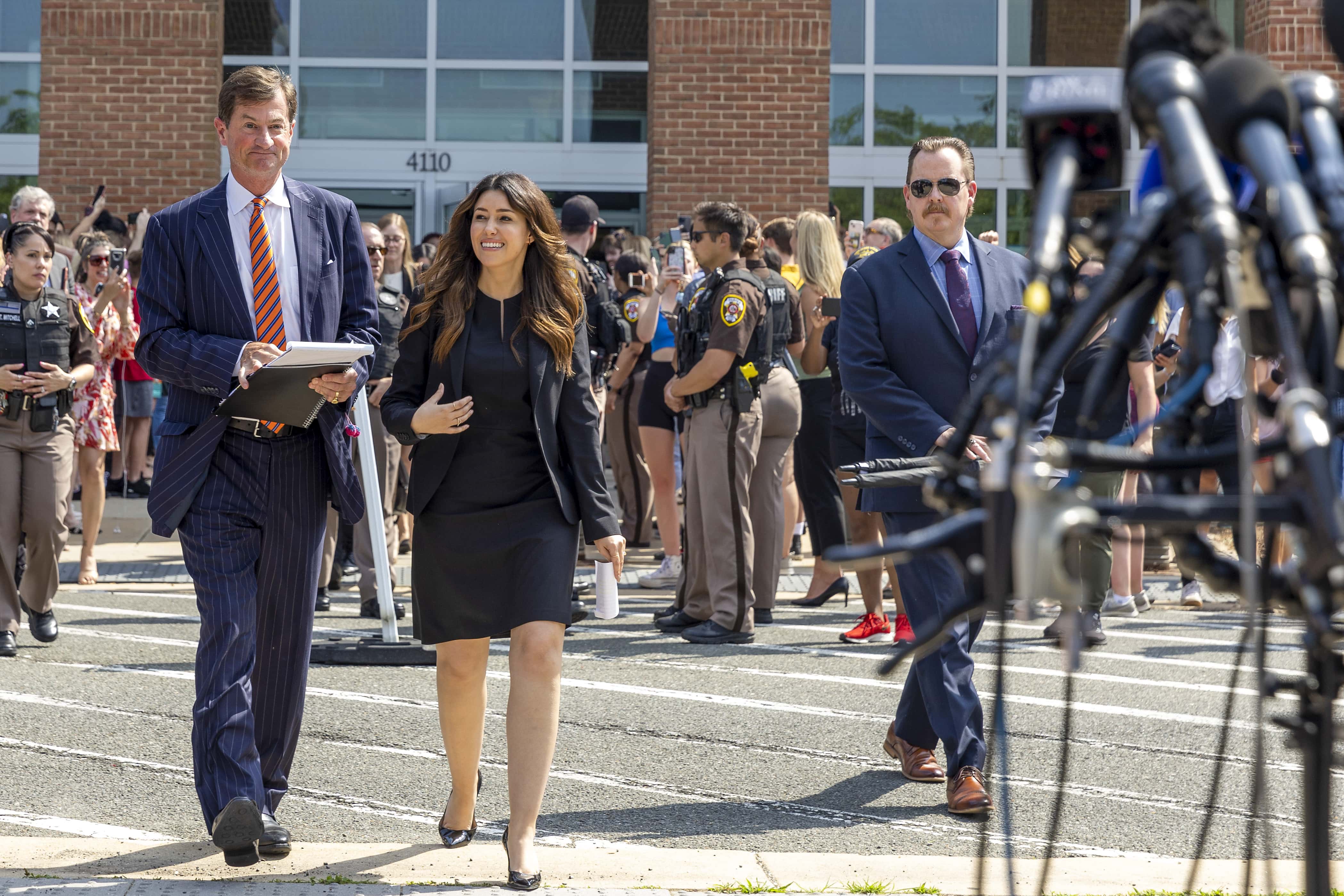 Ben Chew and Camille Vasquez, attorneys for US actor Johnny Depp, arrive to speak to reporters outside the Fairfax County Circuit Courthouse on June 01, 2022 in Fairfax, Virginia. A US jury found Wednesday that US actress Amber Heard had made defamatory claims of abuse against her ex-husband Johnny Depp, and awarded him $15 million in damages. (Photo by Tasos Katopodis/Getty Images)