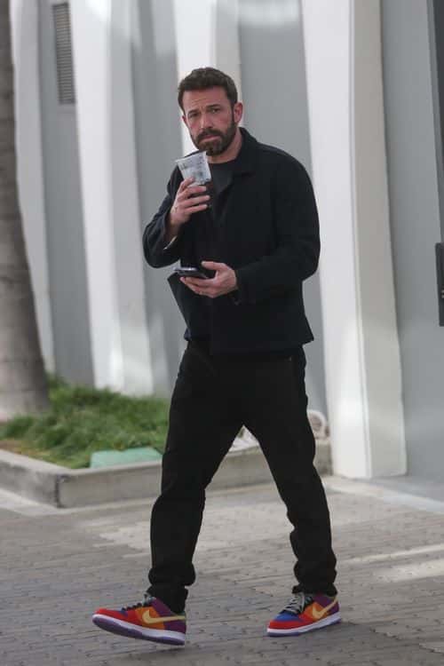 Ben Affleck on his way to a meeting with a large coffee. (Backgrid)