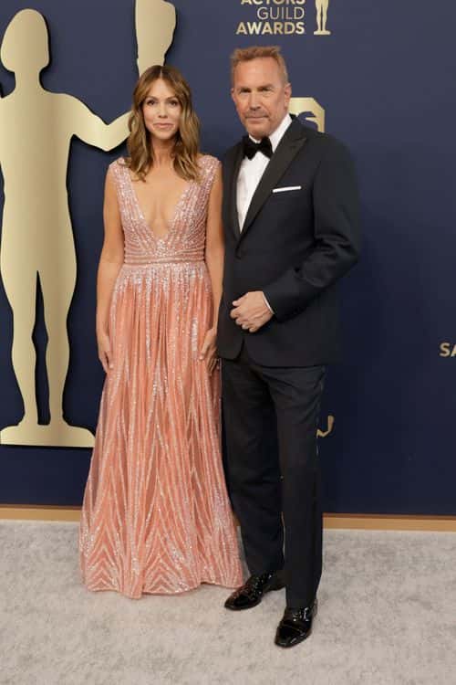 (L-R) Christine Baumgartner and Kevin Costner attend the 28th Annual Screen Actors Guild Awards at Barker Hangar on February 27, 2022 in Santa Monica, California. (Photo by Frazer Harrison/Getty Images)