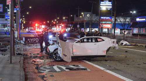 The car slammed into a wall and a utility pole and was split in half on Hylan Boulevard around 4:45 a.m (Facebook/Coolmediaplanet)