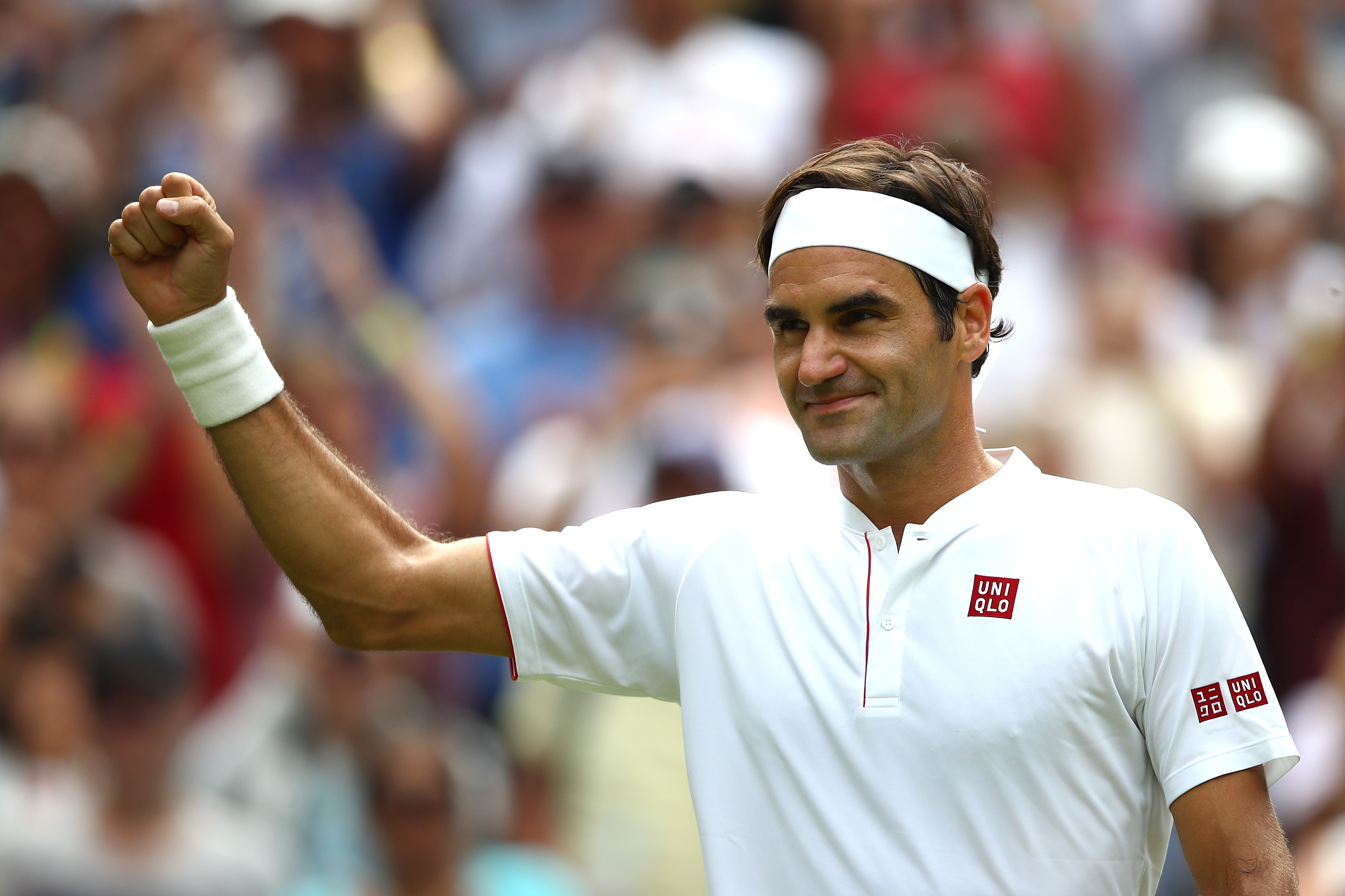 Roger Federer of Switzerland celebrates match point against Lukas Lacko of Slovakia during their Men's Singles second round match on day three of the Wimbledon Lawn Tennis Championships at All England Lawn Tennis and Croquet Club on July 4, 2018 in London, England.