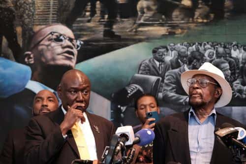 Mustafa Hassan, 84, an associate of Malcolm X, speaks at a news conference with civil rights attorney Ben Crump (L) and Malcolm X's daughter IIyasah Shabazz on July 25, 2023 in New York City. They allege more information has been discovered which they say points to efforts by the FBI to cover up a conspiracy to murder Malcolm X. Crump and his team said they were unveiling the information, including a new witness speaking for the first time, to show negligence or a possible cover up in the investigation of the famed civil rights leader. Mr. Hassan was at the scene of the assassination but was never interviewed by police. He allegedly heard police ask if a suspected gunman was 