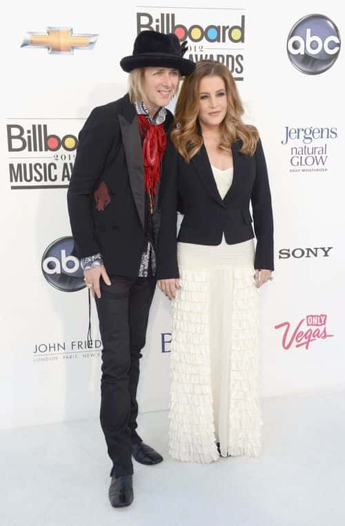 Michael Lockwood (L) and Lisa Marie Presley arrive at the 2012 Billboard Music Awards held at the MGM Grand Garden Arena on May 20, 2012 in Las Vegas, Nevada. (Photo by Frazer Harrison/Getty Images for ABC)