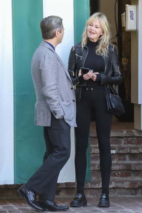 Melanie Griffith looks pretty and youthful as she dons all-black ensemble for lunch outing with friend (Backgrid)