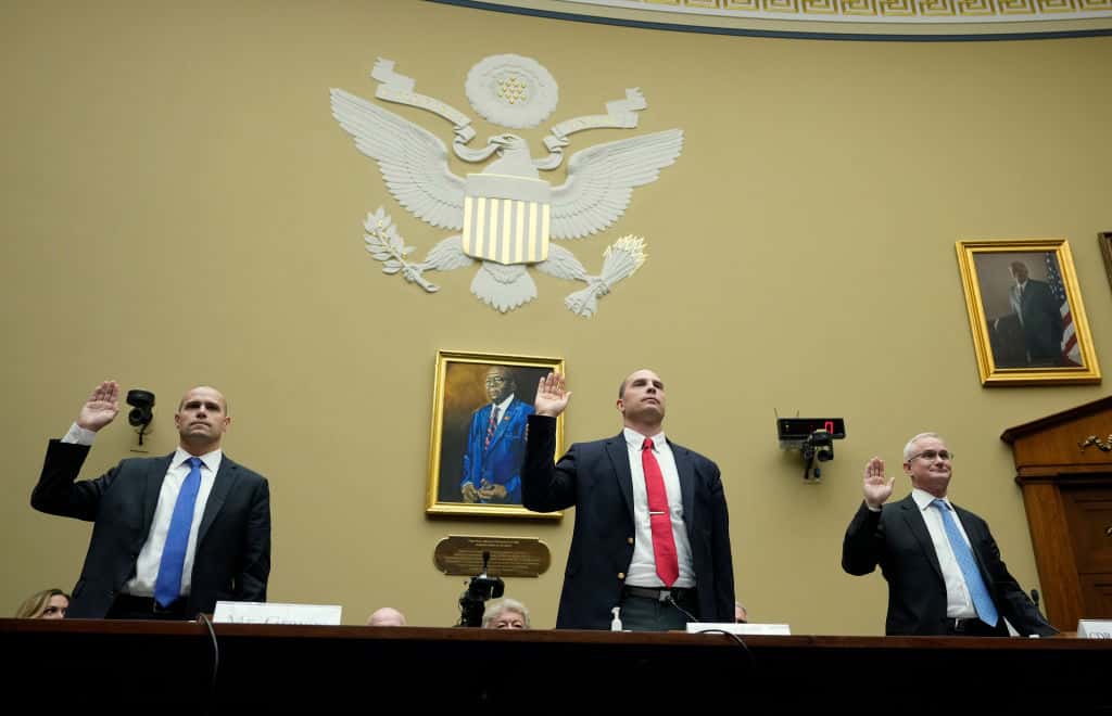WASHINGTON, DC - JULY 26: Ryan Graves, executive director of Americans for Safe Aerospace, David Grusch, former National Reconnaissance Officer Representative of Unidentified Anomalous Phenomena Task Force at the U.S. Department of Defense, and Retired Navy Commander David Fravor are sworn-in during a House Oversight Committee hearing titled “Unidentified Anomalous Phenomena: Implications on National Security, Public Safety, and Government Transparency” on Capitol Hill 26, 2023 in Washington, DC. Several witnesses are testifying about their experience with possible UFO encounters and discussion about a potential covert government program concerning debris from crashed, non-human origin spacecraft. (Photo by Drew Angerer/Getty Images)
