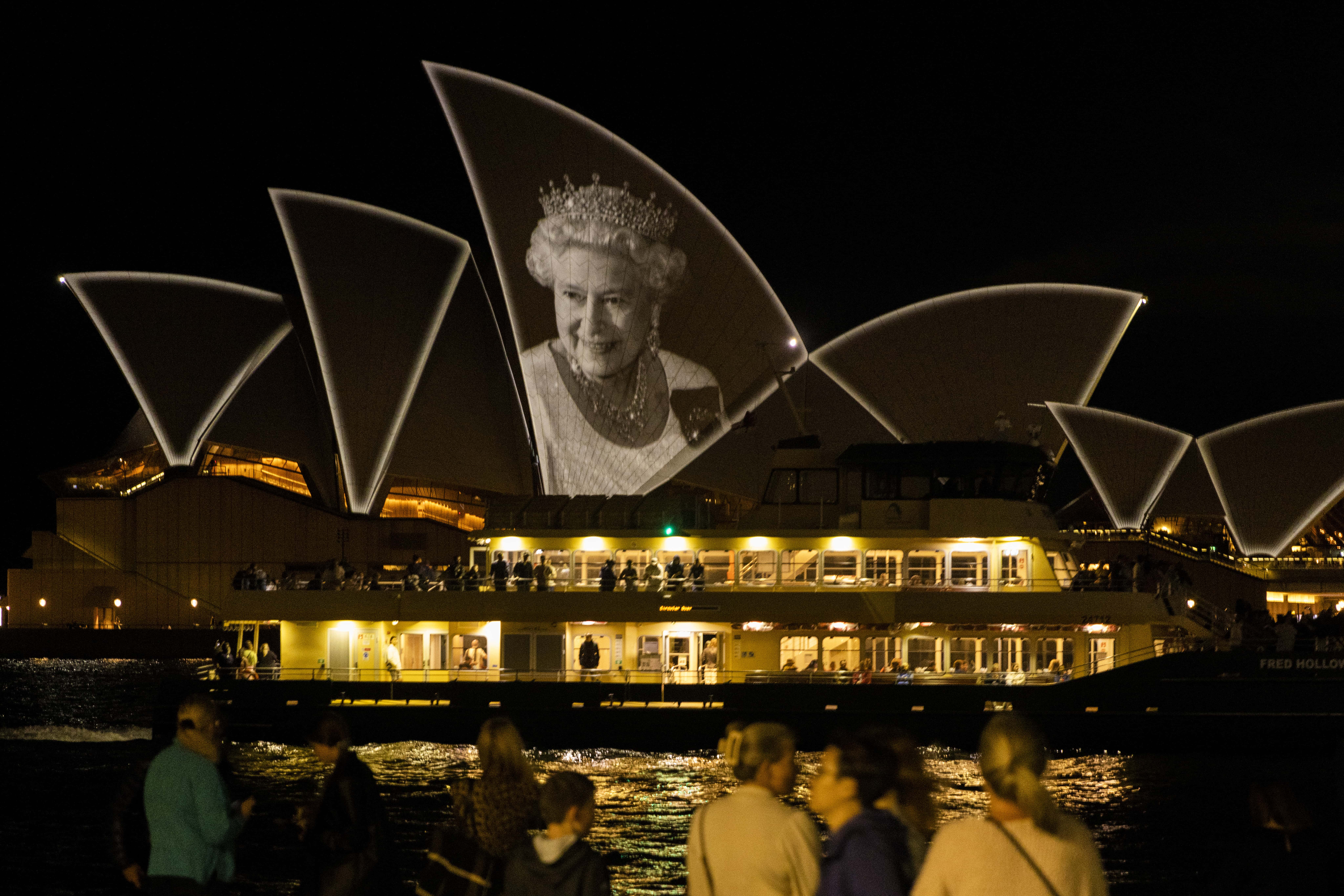 An image of the late Queen Elizabeth II is projected onto the sails of the Sydney Opera House on September 10, 2022 in Sydney, Australia. Queen Elizabeth II died at Balmoral Castle in Scotland aged 96 on September 8, 2022, and is survived by her four children, Charles, Prince of Wales, Anne, Princess Royal, Andrew, Duke Of York and Edward, Duke of Wessex. Elizabeth Alexandra Mary Windsor was born in Bruton Street, Mayfair, London on 21 April 1926. She married Prince Philip in 1947 and acceded the throne of the United Kingdom and Commonwealth on 6 February 1952 after the death of her Father, King George VI. Queen Elizabeth II was the United Kingdom's longest-serving monarch.