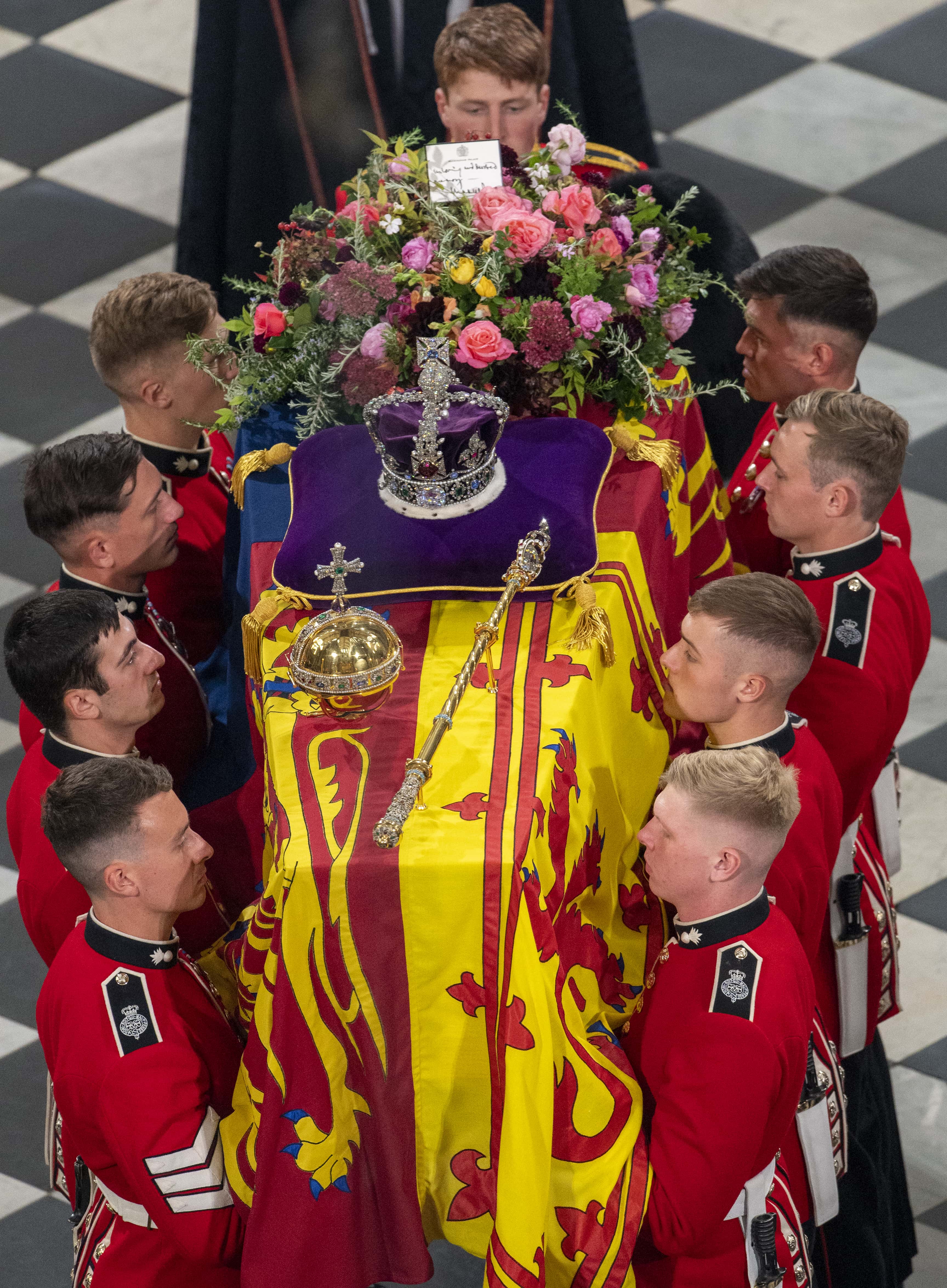 The pall bearers lead the coffin away during the State Funeral of Queen Elizabeth II at Westminster Abbey on September 19, 2022 in London, England.  Elizabeth Alexandra Mary Windsor was born in Bruton Street, Mayfair, London on 21 April 1926. She married Prince Philip in 1947 and ascended the throne of the United Kingdom and Commonwealth on 6 February 1952 after the death of her Father, King George VI. Queen Elizabeth II died at Balmoral Castle in Scotland on September 8, 2022, and is succeeded by her eldest son, King Charles III.