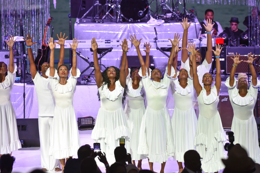 Dancer-choreographer Lisa McCall and dancers perform on stage at a Tribute Concert to celebrate the life of songstress Aretha Franklin at Chene Park on August 30, 2018 in Detroit, Michigan. (Photo by Aaron J. Thornton/Getty Images)