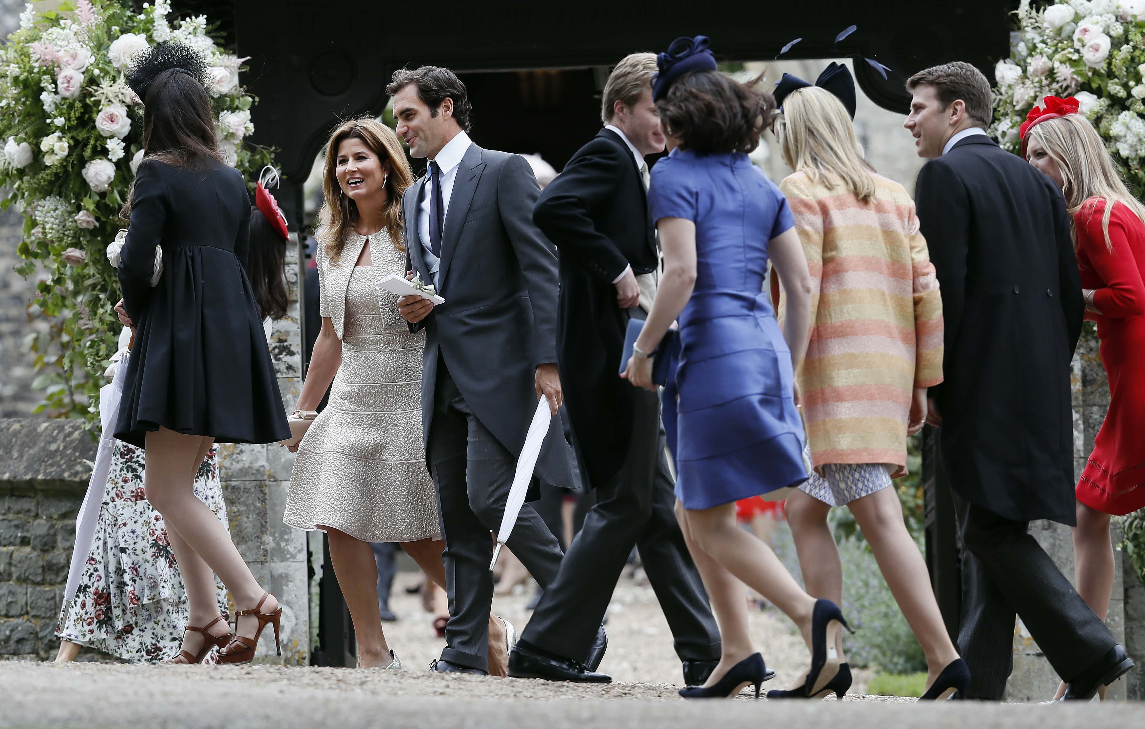 Roger Federer and his wife Mirka leave after the wedding of Pippa Middleton and James Matthews at St Mark's Church onMay 20, 2017 in Englefield, England.Middleton, the sister of Catherine, Duchess of Cambridge married hedge fund manager James Matthews in a ceremony Saturday where her niece and nephew Prince George and Princess Charlotte was in the wedding party, along with sister Kate and princes Harry and William. (Photo by Kirsty Wigglesworth - Pool/Getty Images)