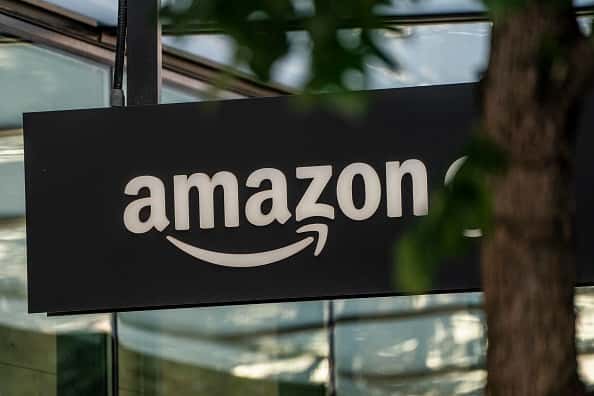 SEATTLE, WA - MAY 20: A sign is seen outside of an Amazon Go store at the Amazon.com Inc. headquarters on May 20, 2021 in Seattle, Washington. Five women employees sued Amazon this week, alleging discrimination and retaliation. (Photo by David Ryder/Getty Images)