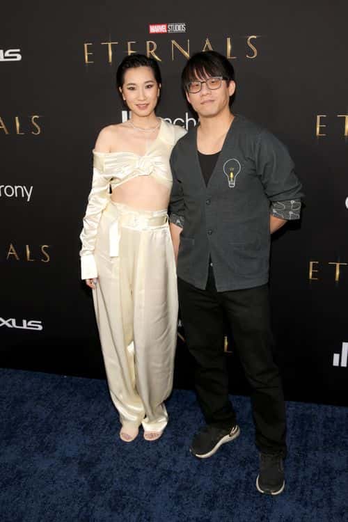 (L-R) Meng'er Zhang and Yung Lee arrive at the Premiere of Marvel Studios' Eternals on October 18, 2021 in Hollywood, California.