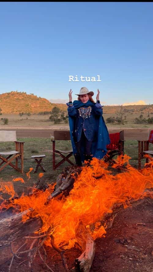 The collection captured Madonna adorning skin-tight trousers with boots and a patterned shirt, which she layered with a rain jacket and a huge turquoise shawl.  (Madonna/Instagram)