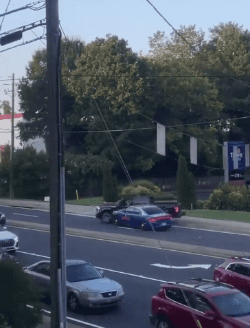 The police car is seen smashing into the vehicle several times, then using a pursuit tactic known as a PIT maneuver 