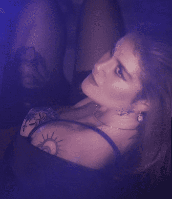 Diana Isakova, 25, posted flyers against the conflict which led to her arrest (East2WestNews)