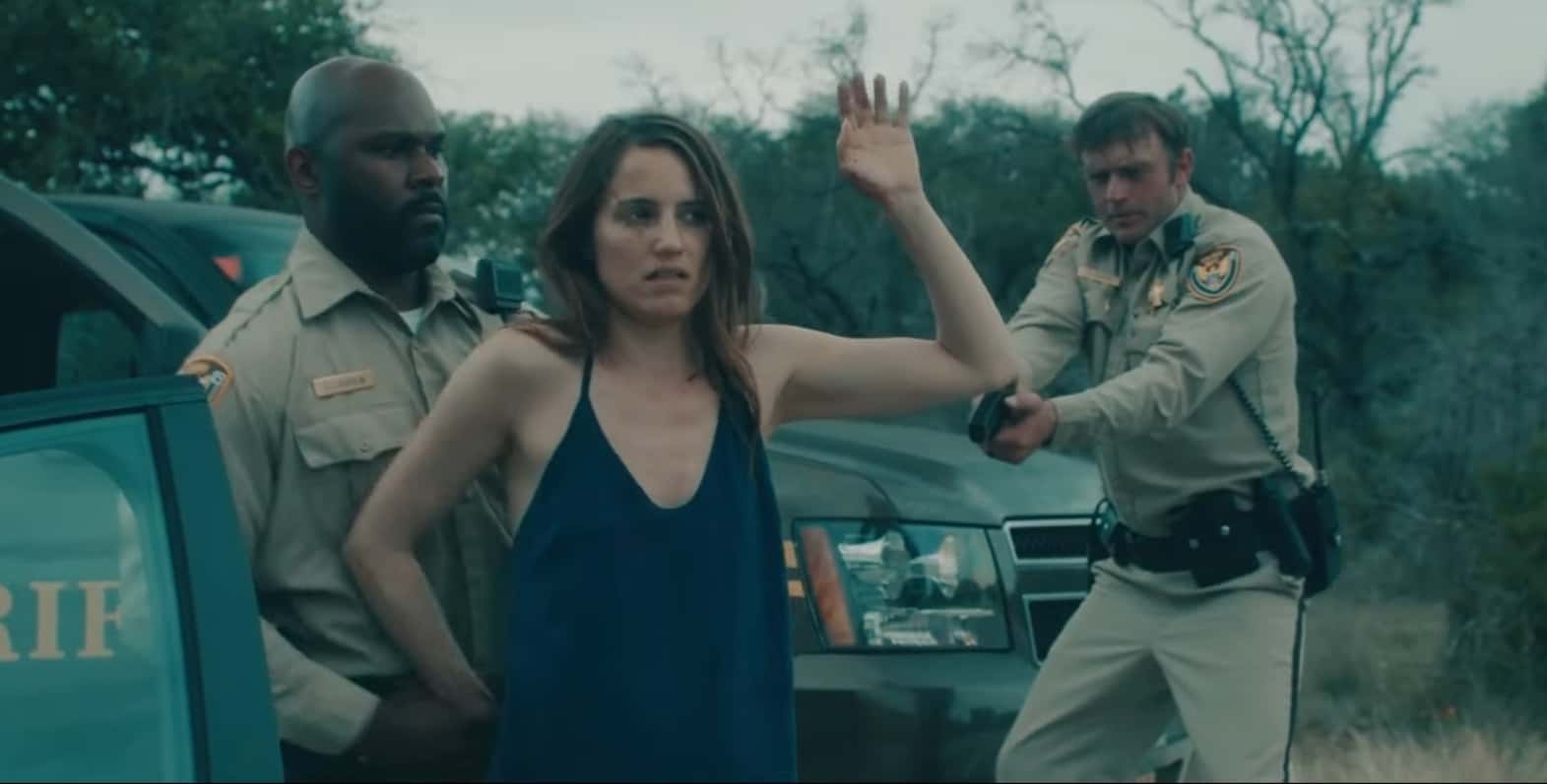 Ella getting arrested after killing her father in 'Clock' (Hulu)