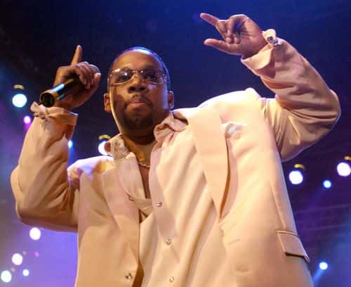 Michael Bivins of New Edition performs at the 10th Anniversary Essence Music Festival at the Superdome on July 4, 2004 in New Orleans, Louisiana.