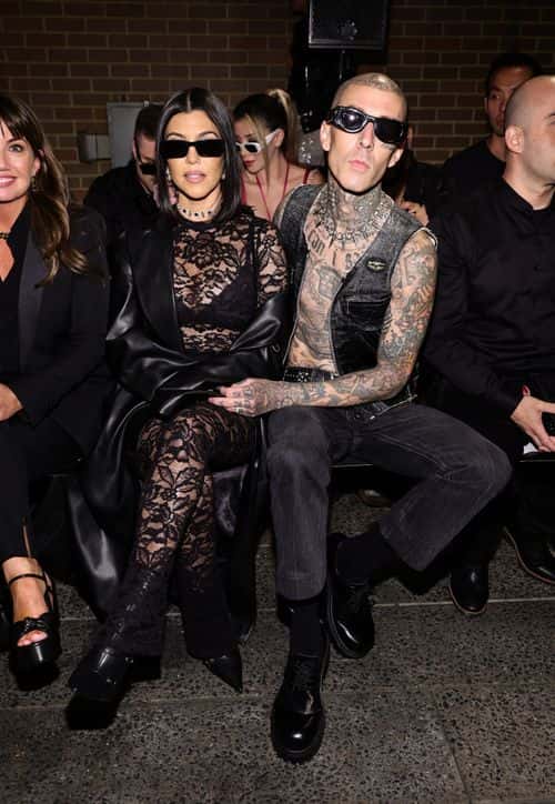 Kourtney Kardashian Barker and Travis Barker attend Boohoo by Kourtney Kardashian Barker's New York Fashion Week debut, at Highline on September 13, 2022 in New York City.