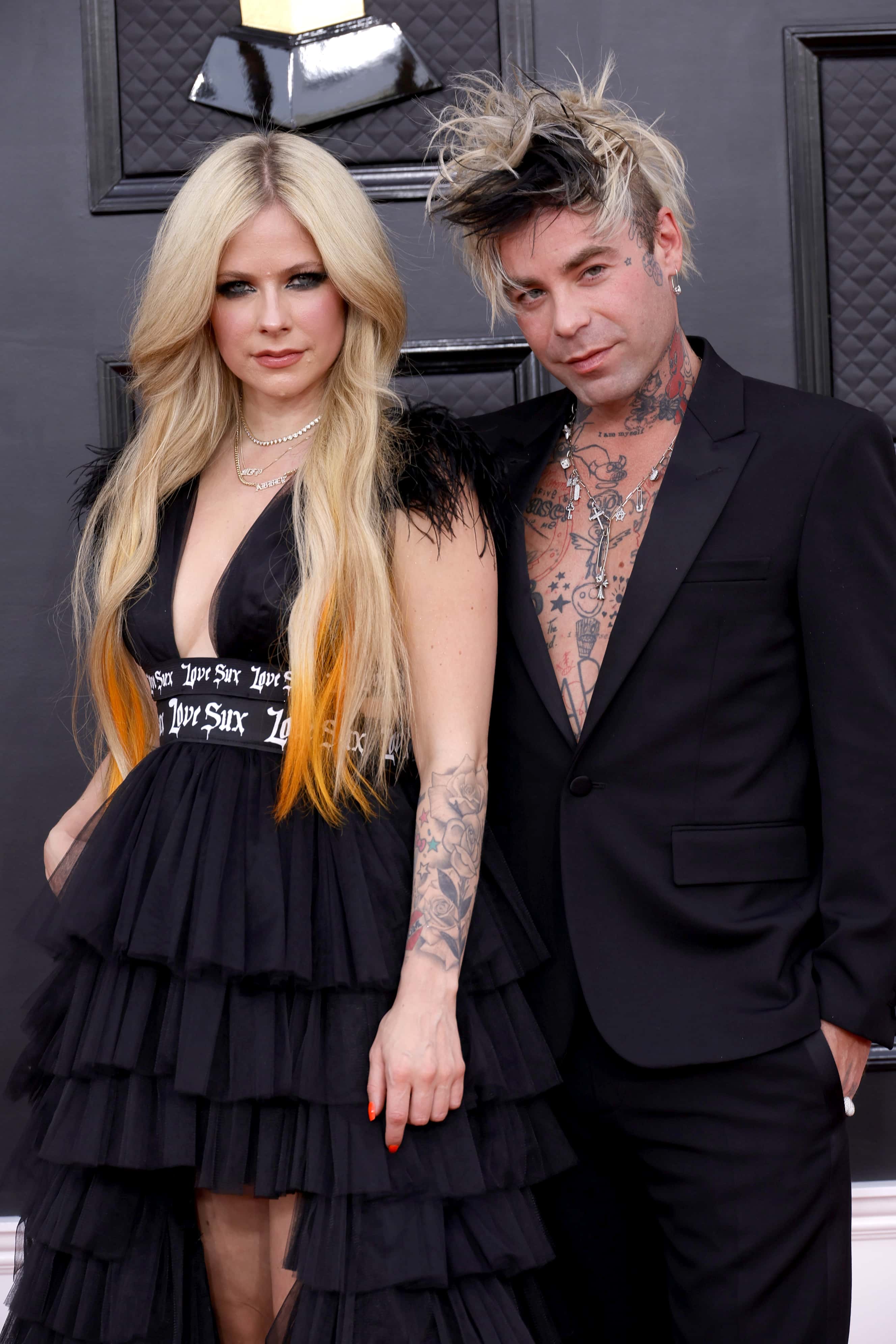 (L-R) Avril Lavigne and Mod Sun attend the 64th Annual GRAMMY Awards at MGM Grand Garden Arena on April 03, 2022 in Las Vegas, Nevada.