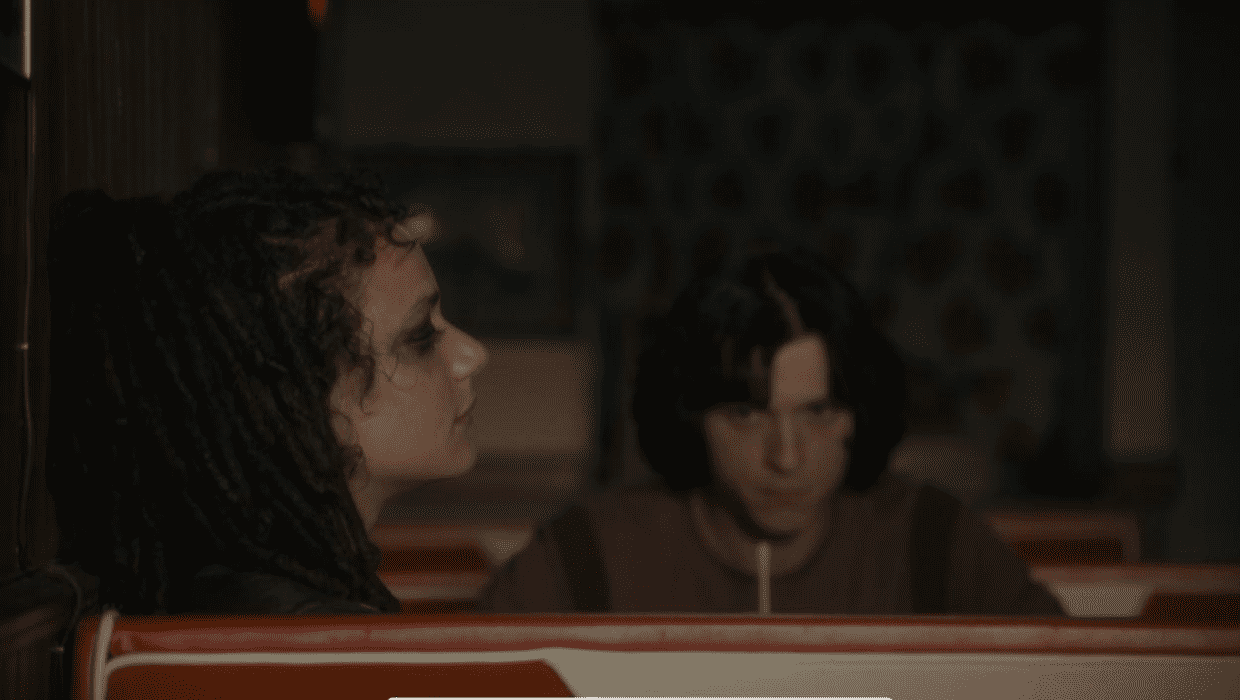 Sasha Lane as Ariana and Tom Holland as Danny Sullivan in Apple TV+ miniseries 'The Crowded Room' (Apple TV+)