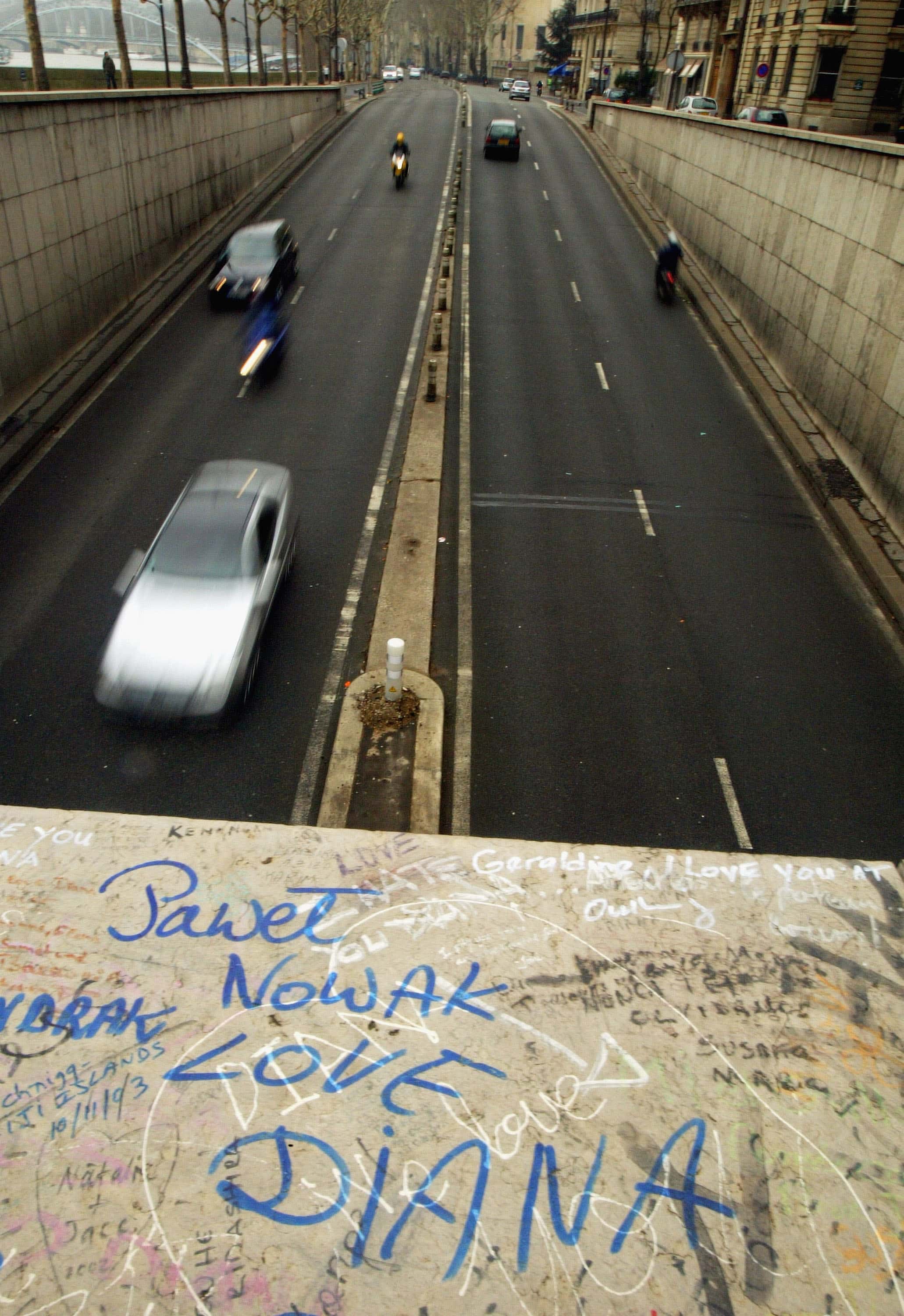 Messages are seen above the entrance to the tunnel where Diana, Princess of Wales and Dodi Al Fayed died in a tragic car crash, January 5, 2004 in Paris. Diana and Dodi died when the Mercedes-Benz they were travelling in crashed in the tunnel on August 31, 1997. Inquests by Surrey Coroner Michael Burgess into the deaths of both Diana and Dodi were launched January 5, 2004.