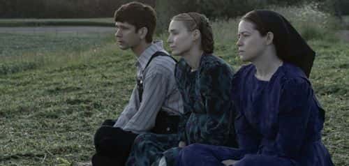 Ben Whishaw, Rooney Mara, and Claire Foy in 'Women Talking' (Universal Pictures)