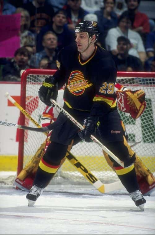 March 1997:  Gino Odjick #29 of the Vancouver Canucks in action during a game against the Calgary Flames at the Canadien Airlines Saddledome in Calgary, Canada. Mandatory Credit: Ian Tomlinson  /Allsport
