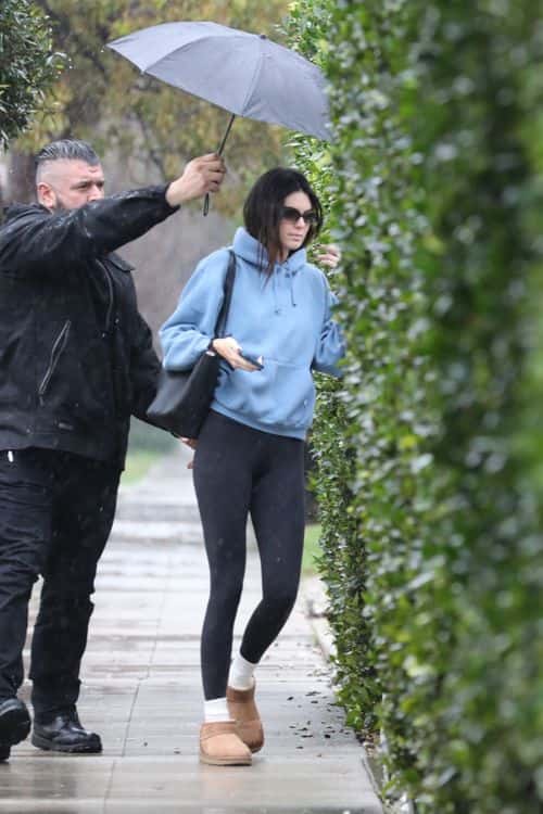 The ‘818 Tequila’ founder opted for a cozy vibe for the day as donned a pair of black leggings with a light blue hooded sweatshirt. (backgrid)