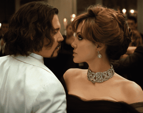 Angelina Jolie and Johnny Depp were rumored to be dating while she was married to Brad Pitt. (IMDb/The Tourist)