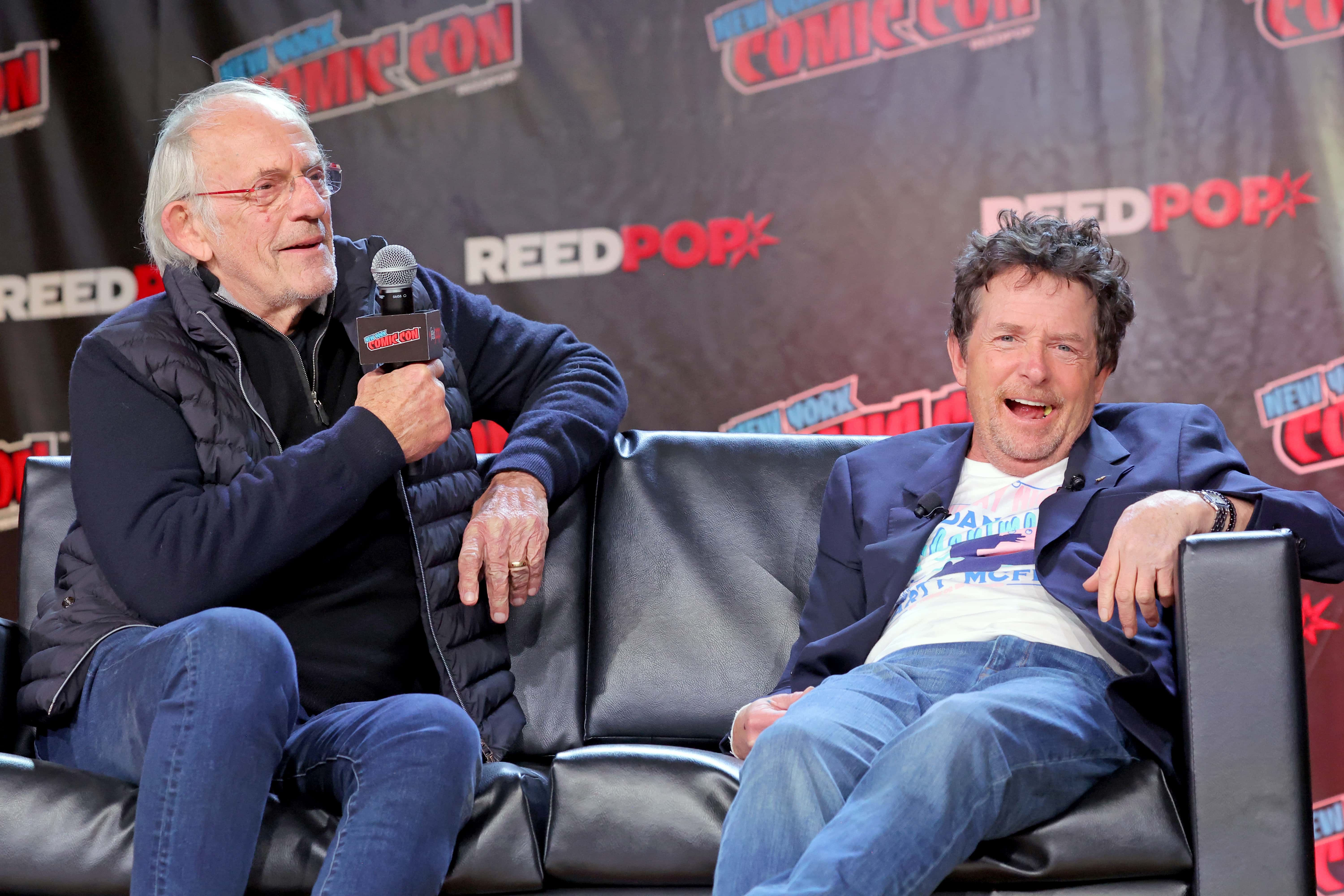 Actors Christopher Lloyd (L) and Michael J. Fox attend a