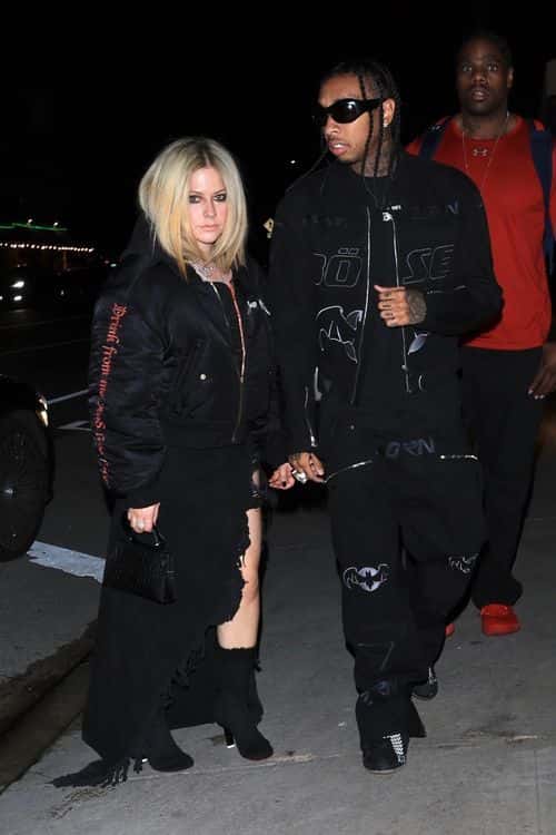 Avril Lavigne and Tyga spotted together as they stepped out for dinner in Santa Monica after confirming their romance (Backgrid)