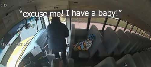 Michigan bus driver, Sue Figueroa, returns the toddler taken during a carjacking to the child's parents. (Screenshot: Kelloggsville Public Schools / LOCAL NEWS X /TMX)