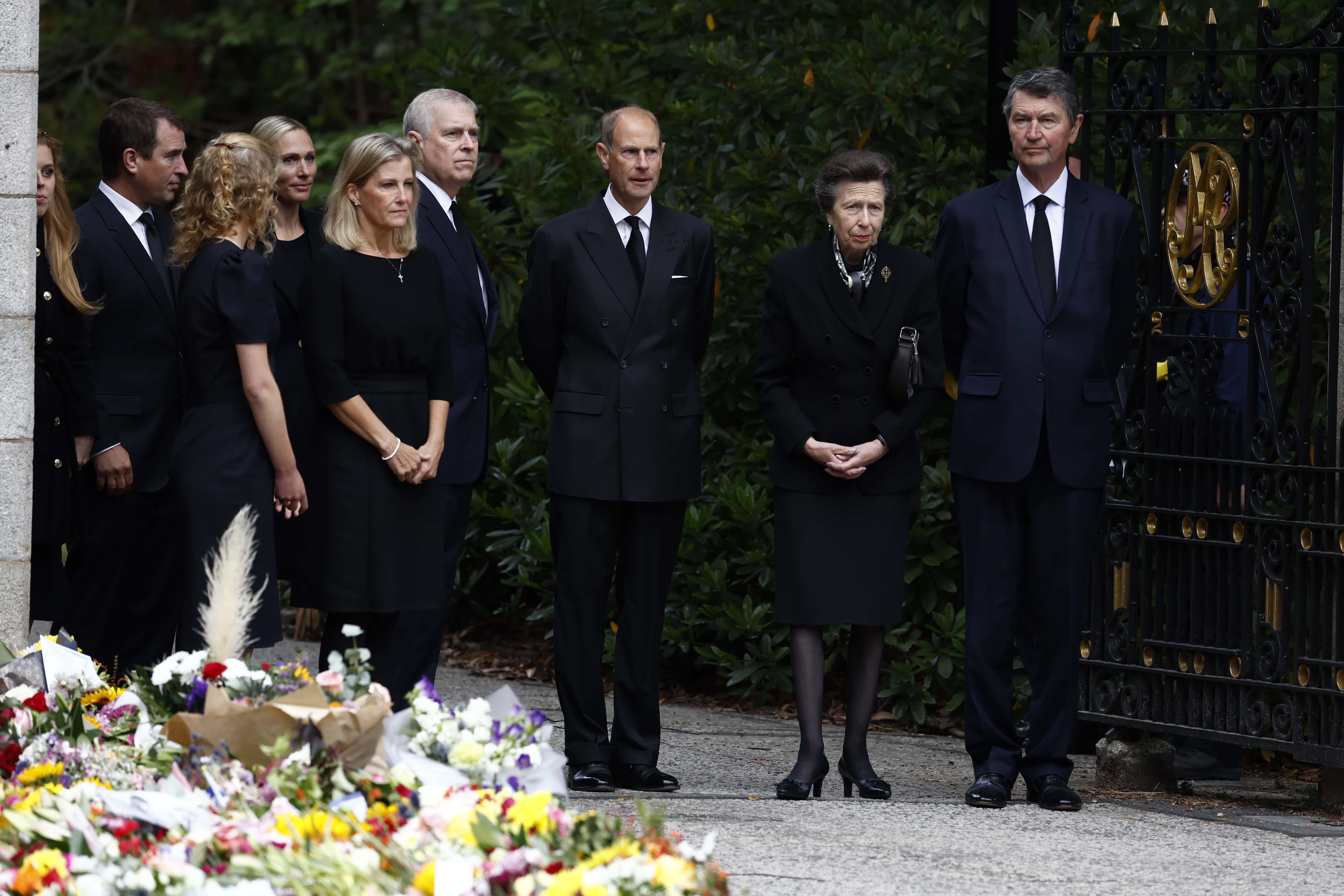 Princess Beatrice of York, Peter Phillips, Lady Louise Windsor, Sophie, Countess of Wessex, Prince Andrew, Duke of York, Edward, Earl of Wessex, Princess Anne, Princess Royal and Vice Admiral Timothy Laurence react to the crowds outside Crathie Kirk church on September 10, 2022 in Crathie near Aberdeen, United Kingdom. Elizabeth Alexandra Mary Windsor was born in Bruton Street, Mayfair, London on 21 April 1926. She married Prince Philip in 1947 and acceded to the throne of the United Kingdom and Commonwealth on 6 February 1952 after the death of her Father, King George VI. Queen Elizabeth II died at Balmoral Castle in Scotland on September 8, 2022, and is succeeded by her eldest son, King Charles III.
