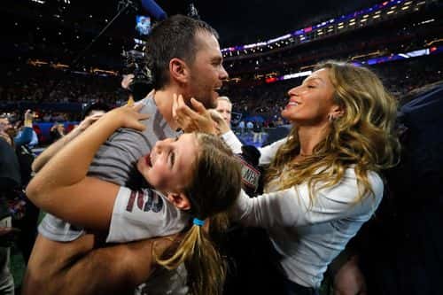Tom Brady #12 of the New England Patriots celebrates with his wife Gisele Bündchen after the Super Bowl LIII against the Los Angeles Rams at Mercedes-Benz Stadium on February 3, 2019 in Atlanta, Georgia. The New England Patriots defeat the Los Angeles Rams 13-3.