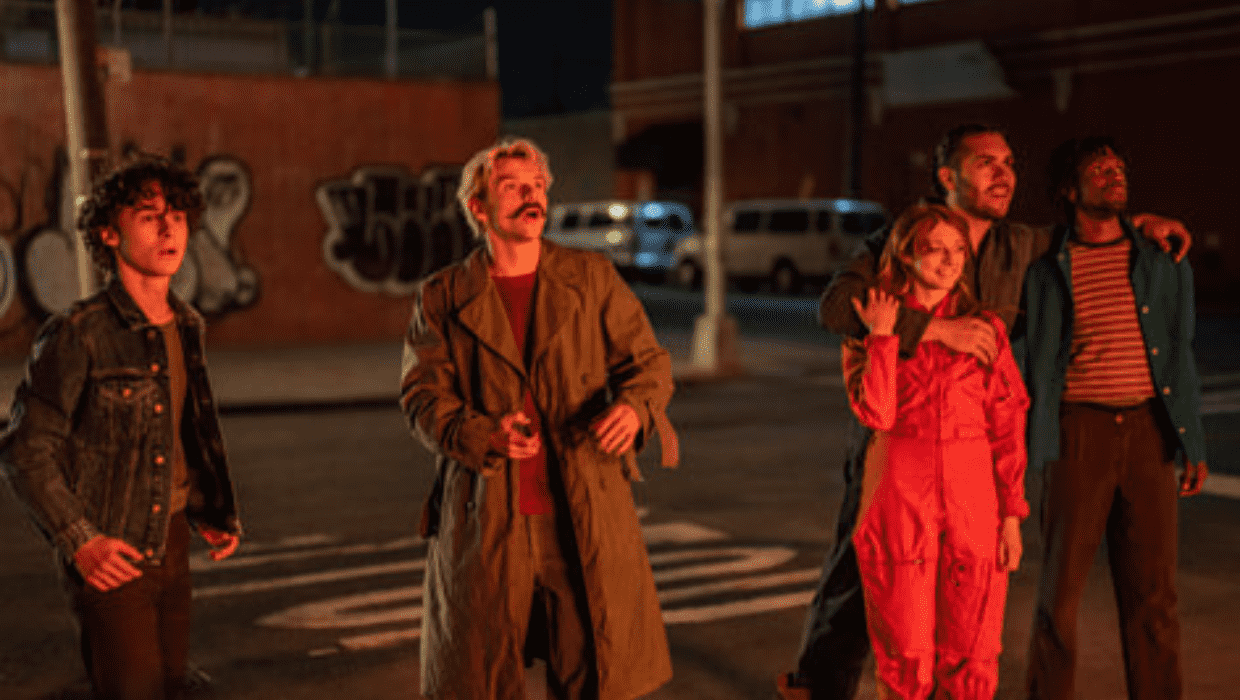 A glimpse of a scene 'City on Fire' featuring Wyatt Oleff, Max Milner, and Alexandra Doke (Apple TV+)