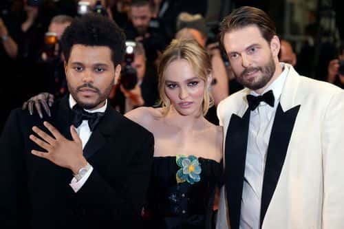 (L-R) Abel “The Weeknd” Tesfaye, Lily-Rose Depp and Sam Levinson attend the 