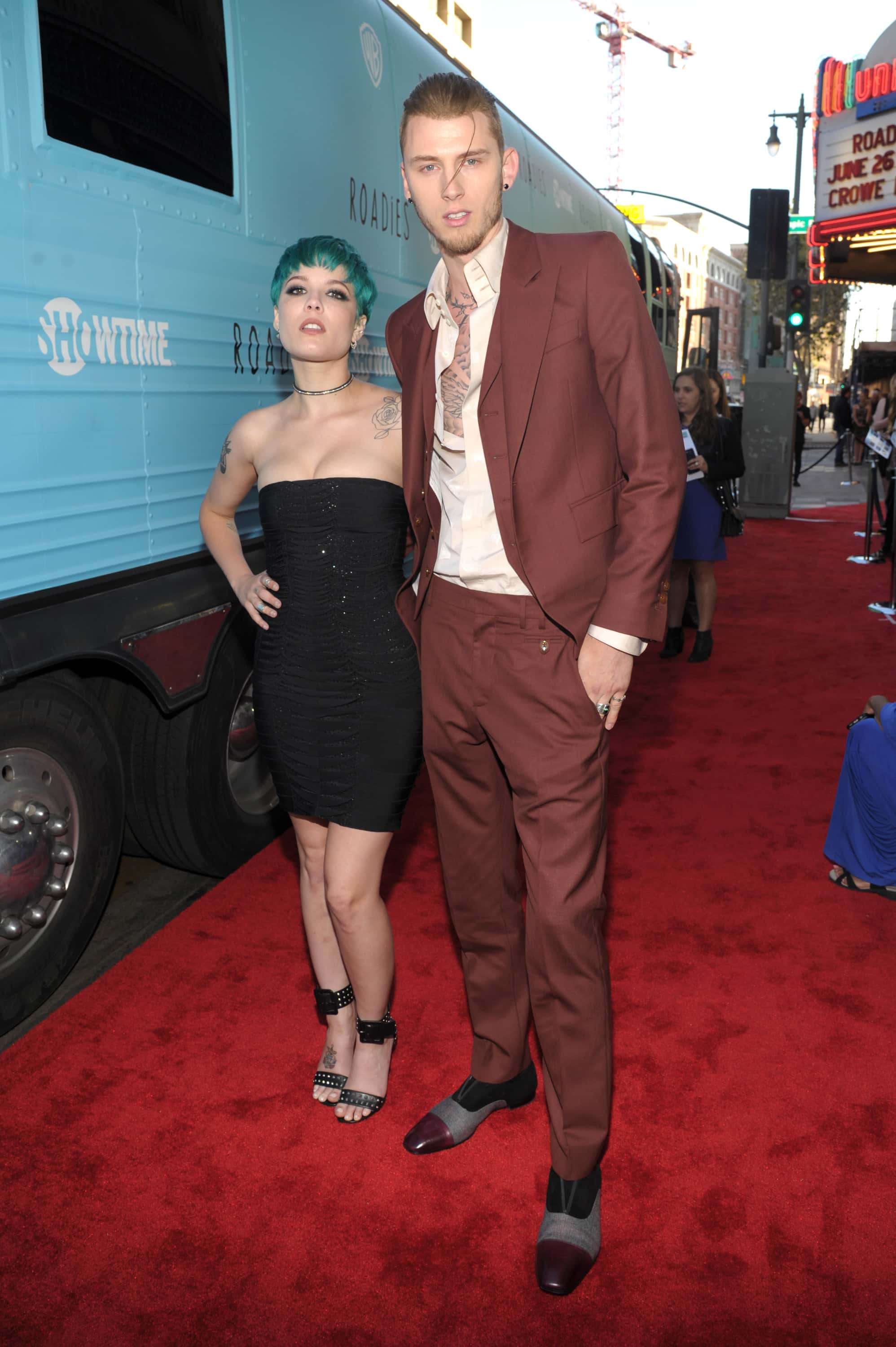 LOS ANGELES, CA - JUNE 06:  Singer Halsey and rapper Machine Gun Kelly attend the premiere for Showt