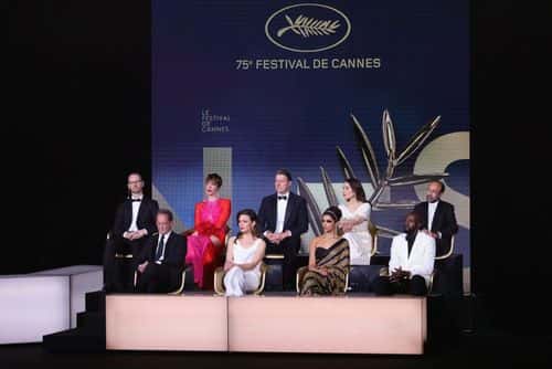 (L to R) Jury members Joachim Trier, Vincent Lindon, Rebecca Hall, Jasmine Trinca, Jeff Nichols, Deepika Padukone, Noomi Rapace, Ladj Ly and Asghar Farhadi attend the opening ceremony for the 75th annual Cannes film festival at Palais des Festivals on May 17, 2022 in Cannes, France.