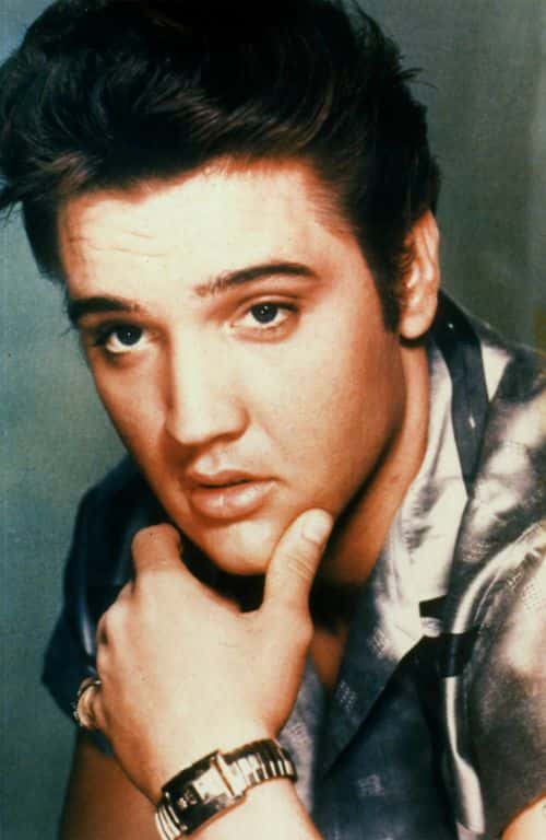 Singer Elvis Presley poses for a studio portrait.