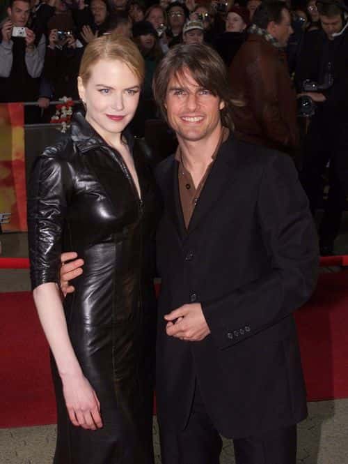 FILE PHOTO: Actor Tom Cruise and his wife Nicole Kidman pose for photographers at the Sydney premiere of
