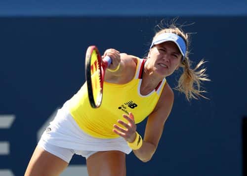 Eugenie Bouchard of Canada serves to Linda Noskova of the Czech Republic during round three of the qualifying round of the US Open at USTA Billie Jean King National Tennis Center on August 25, 2022 in New York City.