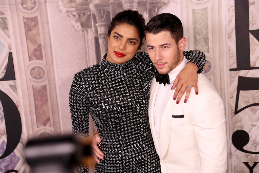 Priyanka Chopra and Nick Jonas attend the Ralph Lauren fashion show during New York Fashion Week at Bethesda Terrace on September 7, 2018, in New York City. (Photo by Rob Kim/Getty Images)