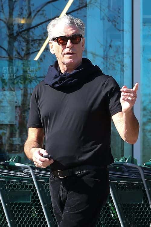 Brosnan opted for a casual yet classy look, styled with a plain black tee and a pair of dark jeans. (Backgrid)