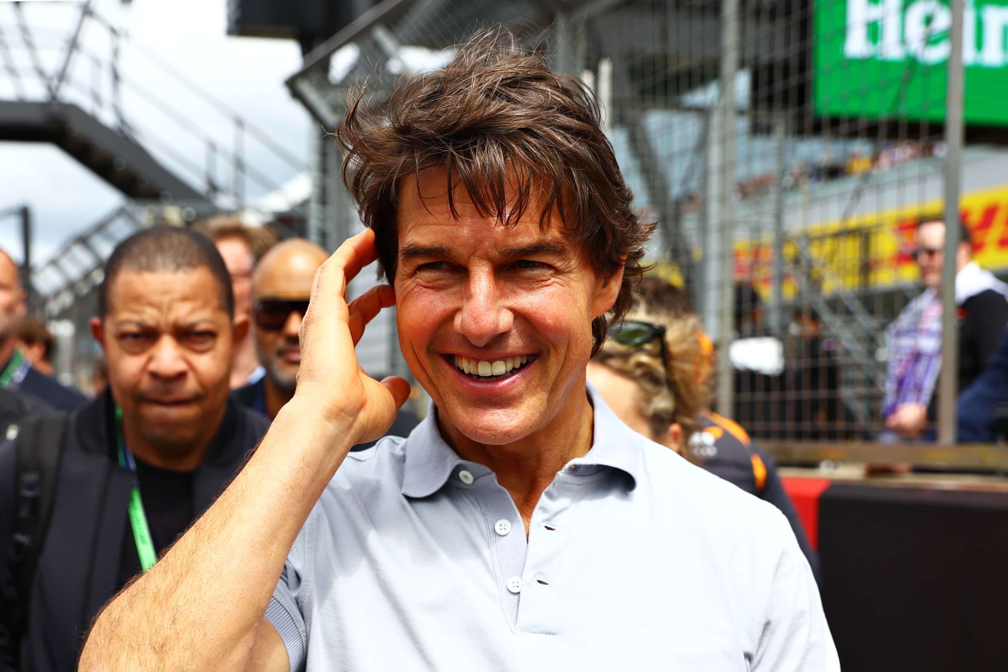 Tom Cruise walks in the Paddock prior to the F1 Grand Prix of Great Britain at Silverstone on July 03, 2022 in Northampton, England.