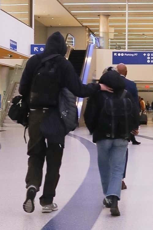 Phoebe Bridgers and Bo Burnham at the airport. (Photo: Backgrid)