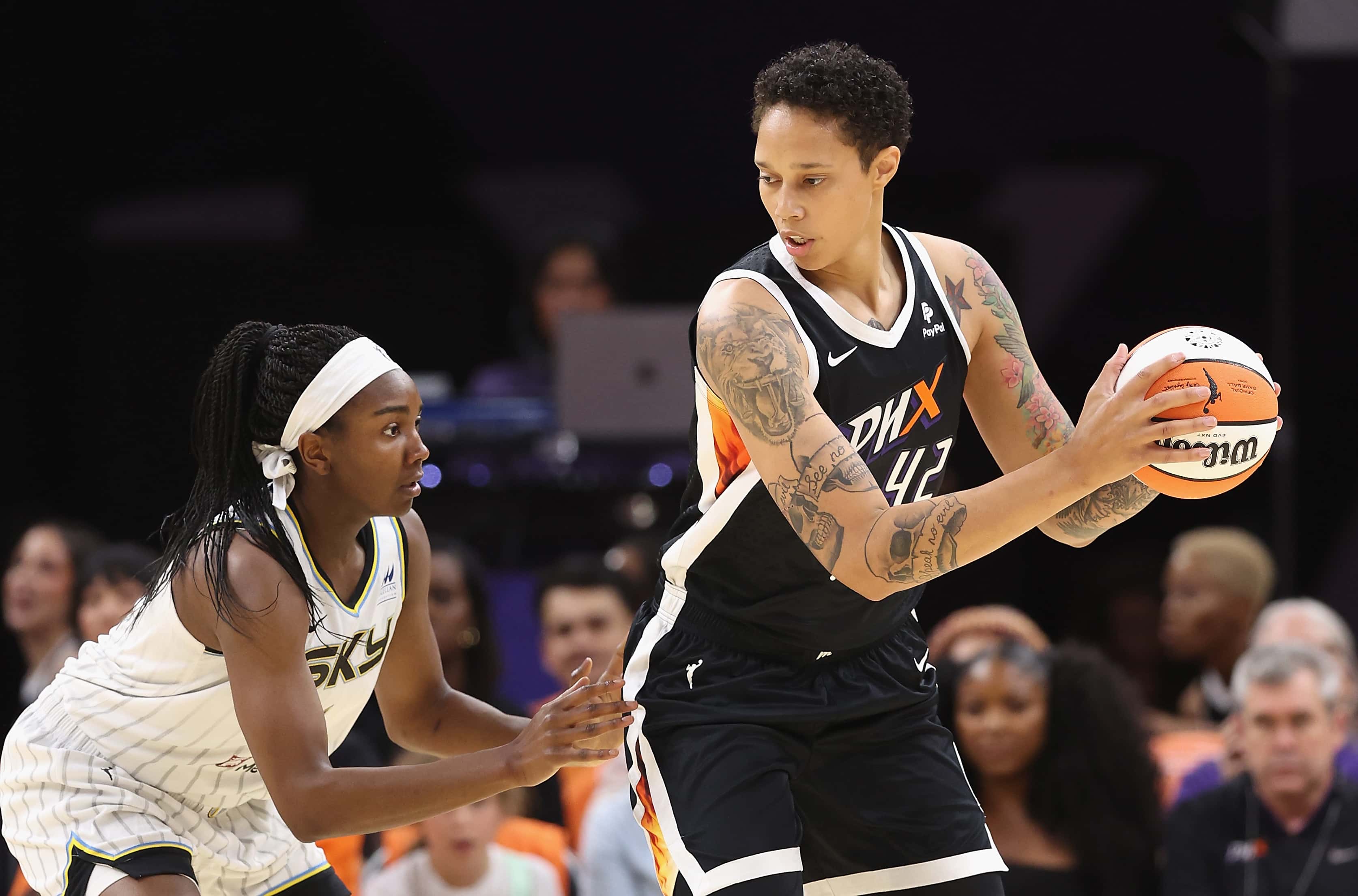 Brittney Griner #42 of the Phoenix Mercury handles the ball against Elizabeth Williams #1 of the Chicago Sky during the first half of the WNBA game at Footprint Center on May 21, 2023 in Phoenix, Arizona. NOTE TO USER: User expressly acknowledges and agrees that, by downloading and or using this photograph, User is consenting to the terms and conditions of the Getty Images License Agreement.