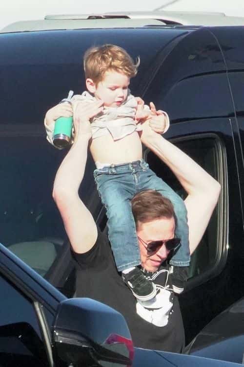 Elon Musk with son at the Super Bowl. (Backgrid)