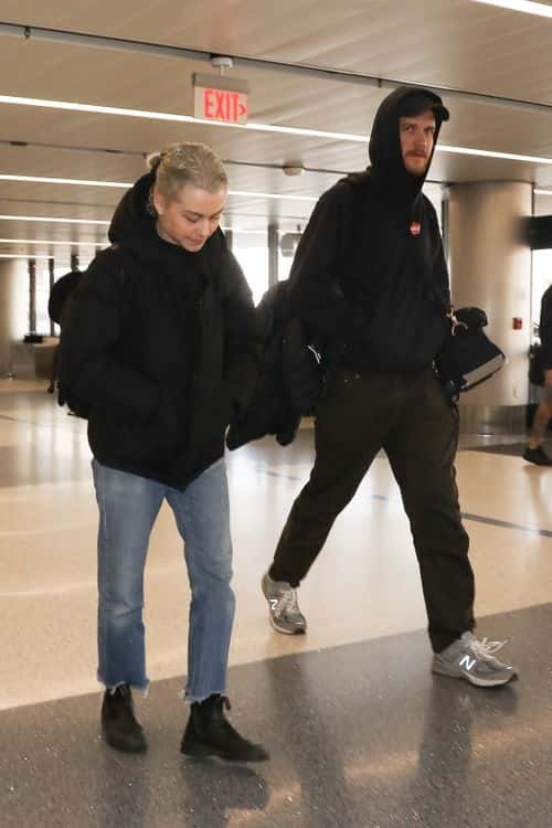 Phoebe Bridgers and Bo Burnham at the airport. (Photo: Backgrid)